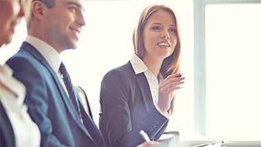 woman asks question at meeting woman asks question at meeting