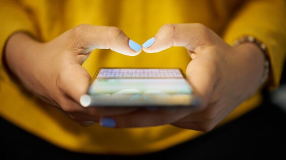 woman typing phone message on social network at night woman typing phone message on social network at night
