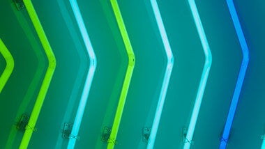 green and blue neon arrows
